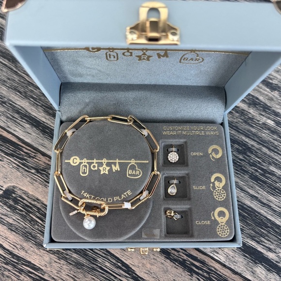 Elegant Gold and Silver Charm Bracelet - Picture 3 of 7